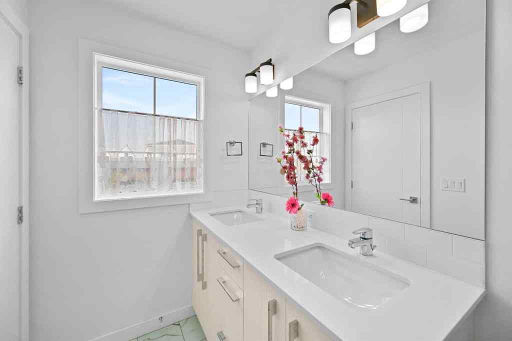 MLS® A2251493 - 60 Amblefield Terrace NW in Moraine Calgary, Residential