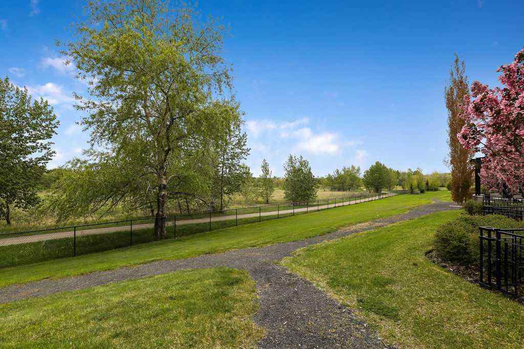 MLS® A2251517 - Unit #404 131 Quarry Way SE in Douglasdale/Glen Calgary, Residential