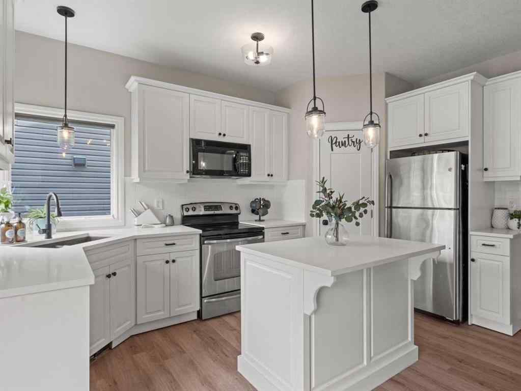 MLS® A2251523 - 502 Sunrise Hill SW in NONE Diamond Valley, Residential