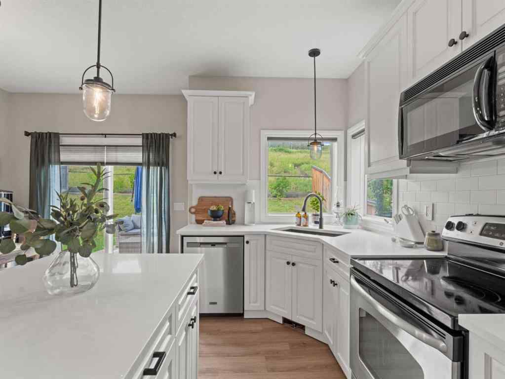 MLS® A2251523 - 502 Sunrise Hill SW in NONE Diamond Valley, Residential