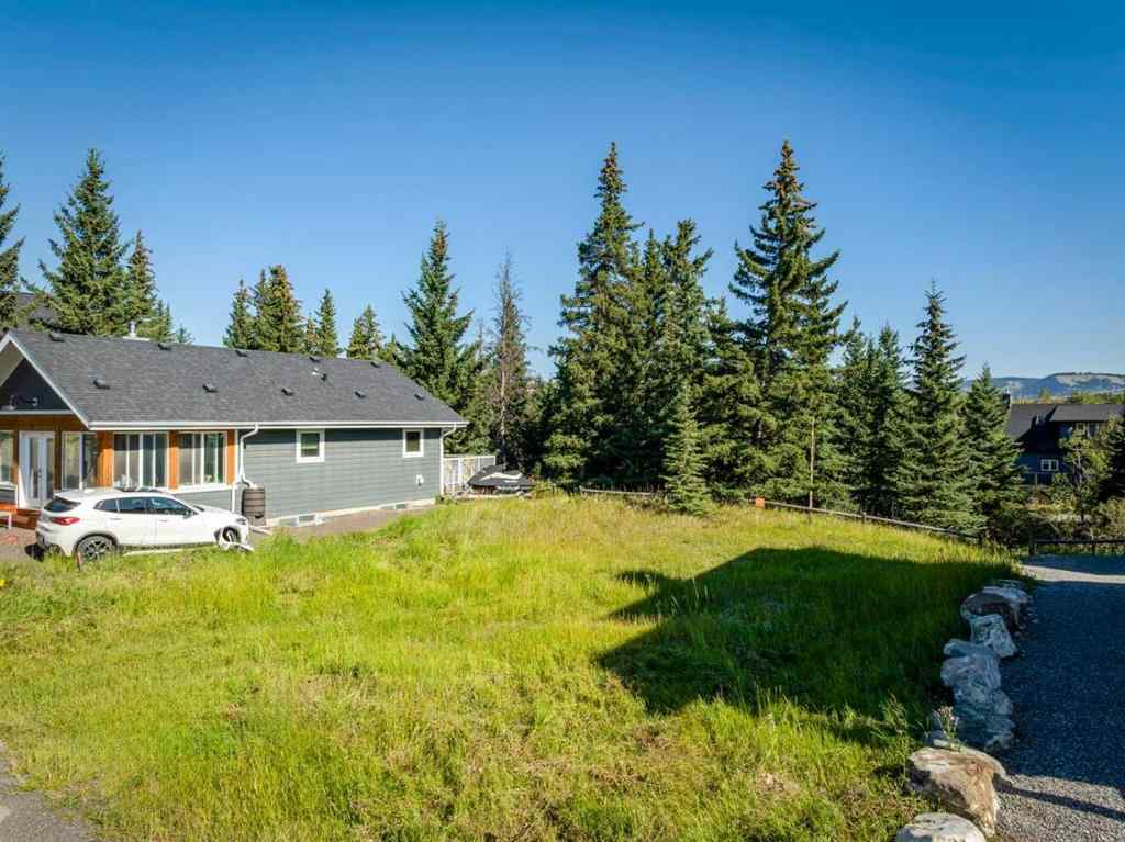 MLS® A2251524 - 404 Cottageclub Grove  in Cottage Club at Ghost Lake Rural Rocky View County, Land