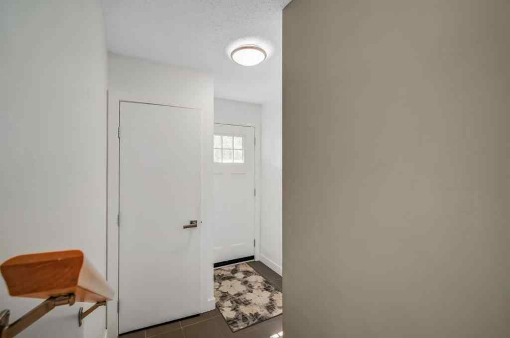 MLS® A2251576 - 836B 68 Avenue SW in Kingsland Calgary, Residential