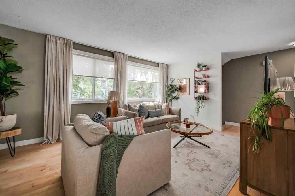 MLS® A2251576 - 836B 68 Avenue SW in Kingsland Calgary, Residential