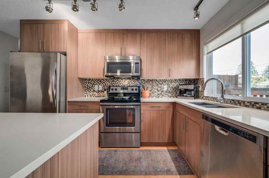 MLS® A2251576 - 836B 68 Avenue SW in Kingsland Calgary, Residential