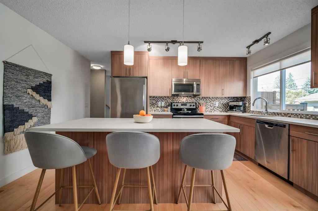 MLS® A2251576 - 836B 68 Avenue SW in Kingsland Calgary, Residential