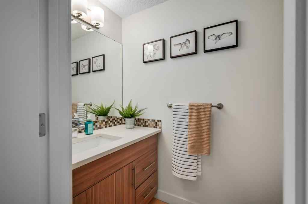 MLS® A2251576 - 836B 68 Avenue SW in Kingsland Calgary, Residential