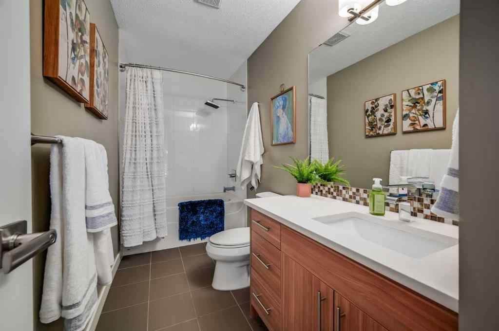 MLS® A2251576 - 836B 68 Avenue SW in Kingsland Calgary, Residential