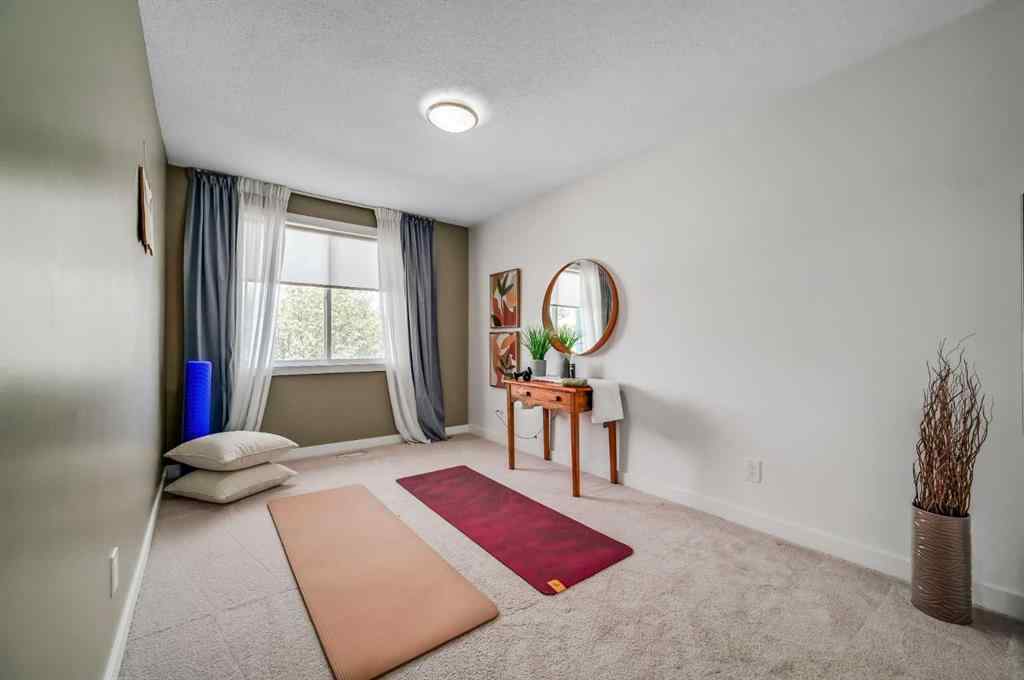 MLS® A2251576 - 836B 68 Avenue SW in Kingsland Calgary, Residential
