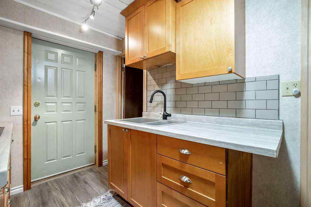 MLS® A2251585 - 728 9 Avenue SE in Emerson Lake Estates High River, Residential