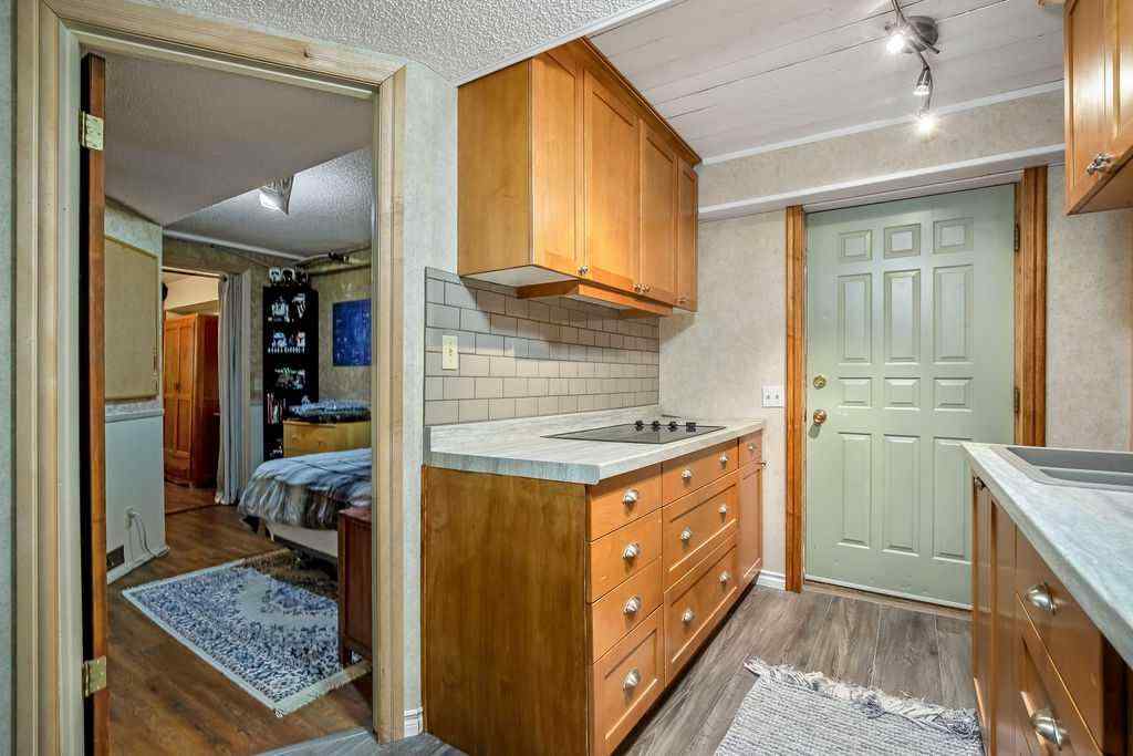 MLS® A2251585 - 728 9 Avenue SE in Emerson Lake Estates High River, Residential