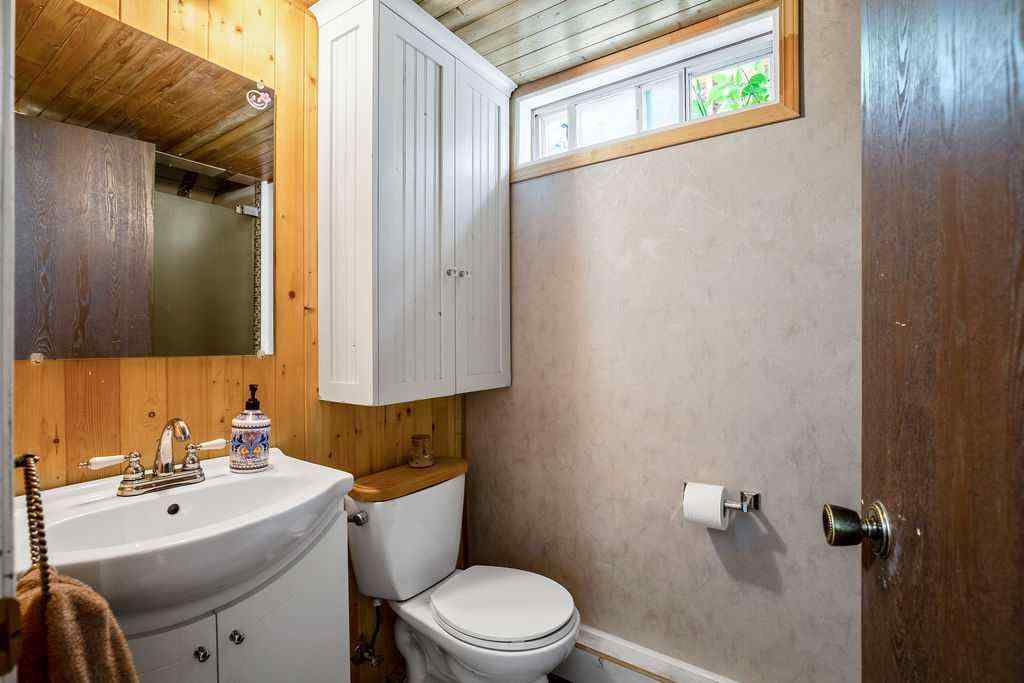 MLS® A2251585 - 728 9 Avenue SE in Emerson Lake Estates High River, Residential