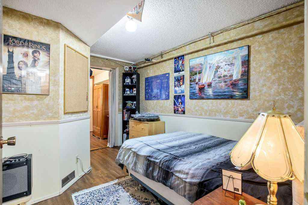 MLS® A2251585 - 728 9 Avenue SE in Emerson Lake Estates High River, Residential