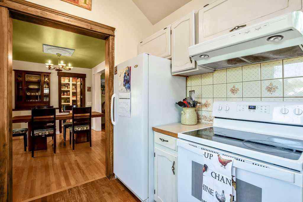 MLS® A2251585 - 728 9 Avenue SE in Emerson Lake Estates High River, Residential