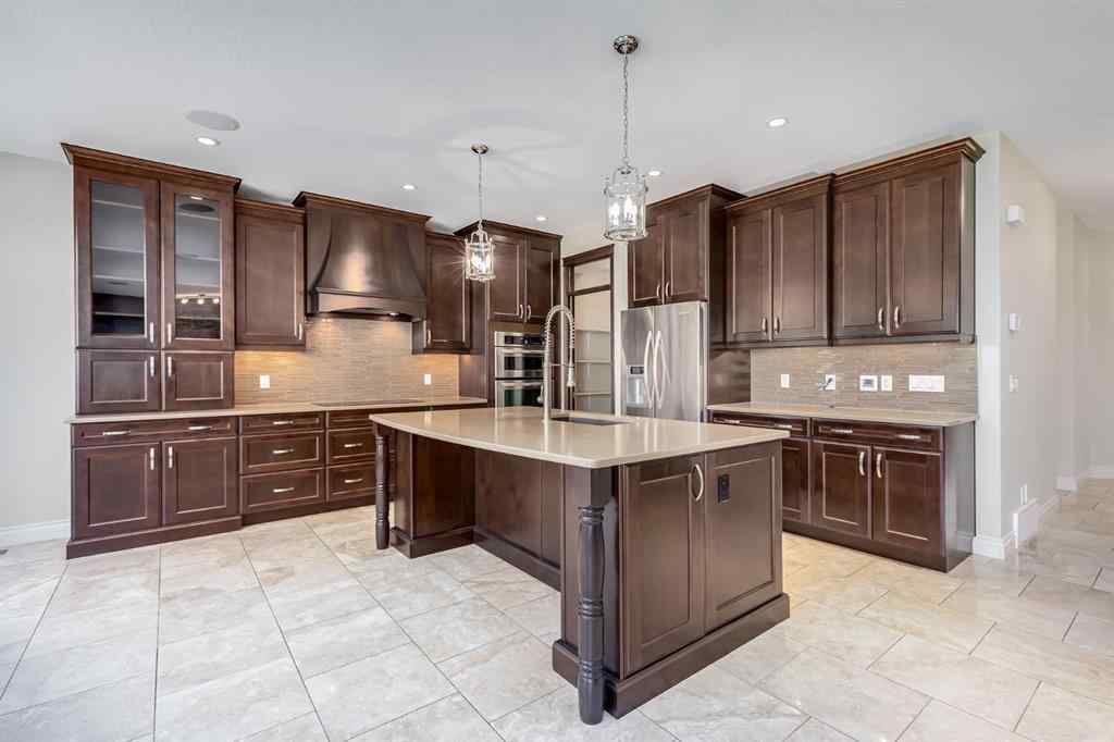 MLS® A2251599 - 202 Cooperstown Lane SW in Coopers Crossing Airdrie, Residential