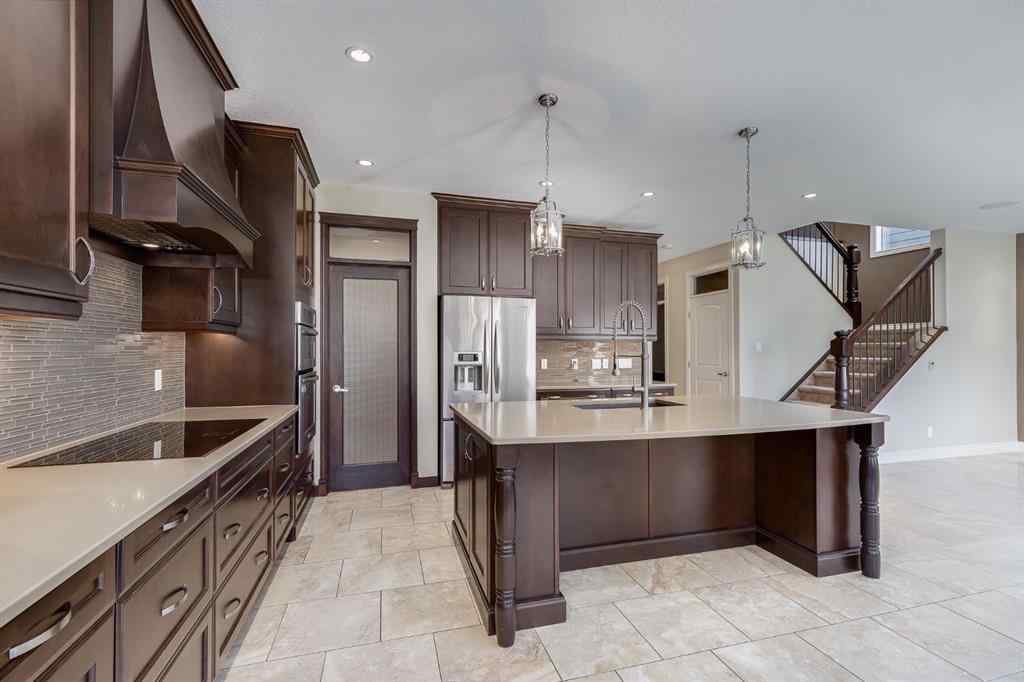 MLS® A2251599 - 202 Cooperstown Lane SW in Coopers Crossing Airdrie, Residential