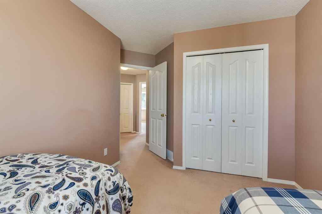 MLS® A2251606 - 165 Spring Crescent SW in Springbank Hill Calgary, Residential