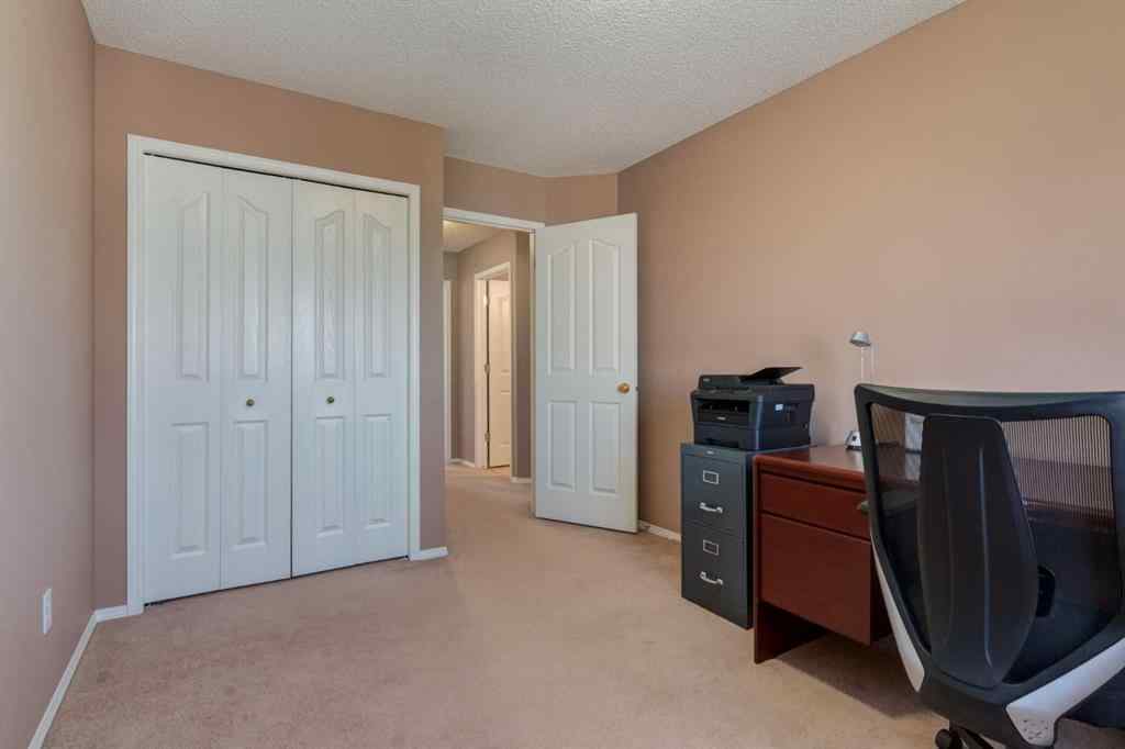 MLS® A2251606 - 165 Spring Crescent SW in Springbank Hill Calgary, Residential