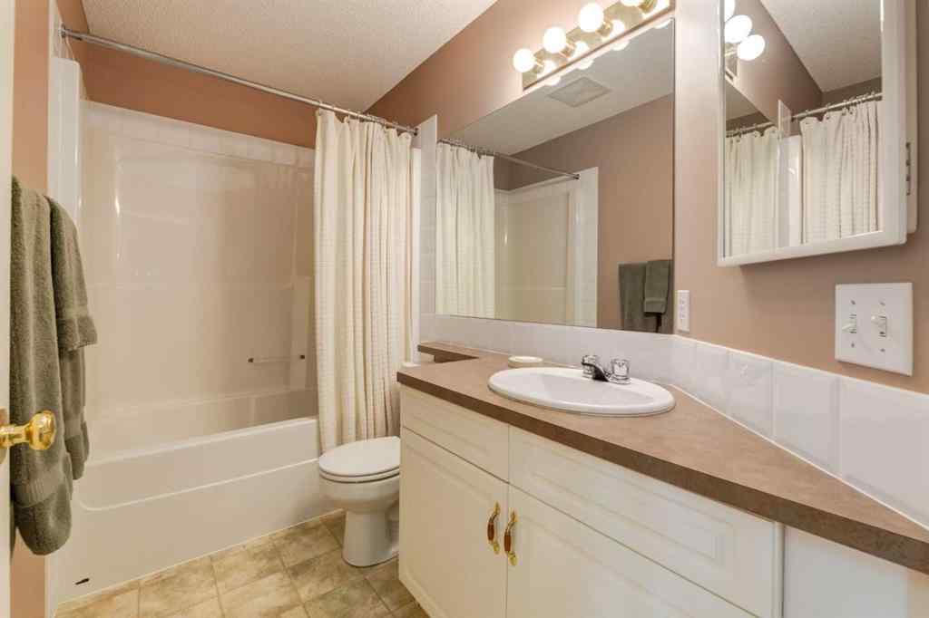MLS® A2251606 - 165 Spring Crescent SW in Springbank Hill Calgary, Residential