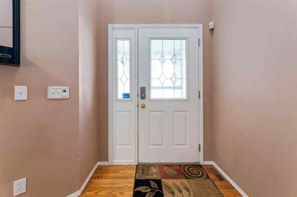 MLS® A2251606 - 165 Spring Crescent SW in Springbank Hill Calgary, Residential