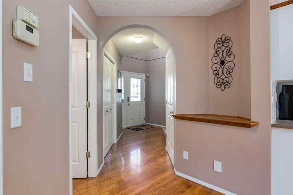 MLS® A2251606 - 165 Spring Crescent SW in Springbank Hill Calgary, Residential