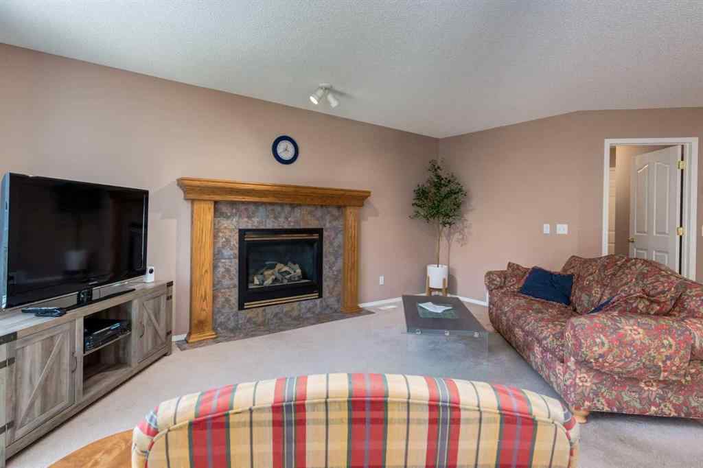 MLS® A2251606 - 165 Spring Crescent SW in Springbank Hill Calgary, Residential