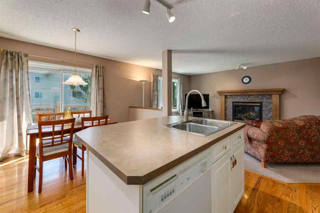 MLS® A2251606 - 165 Spring Crescent SW in Springbank Hill Calgary, Residential