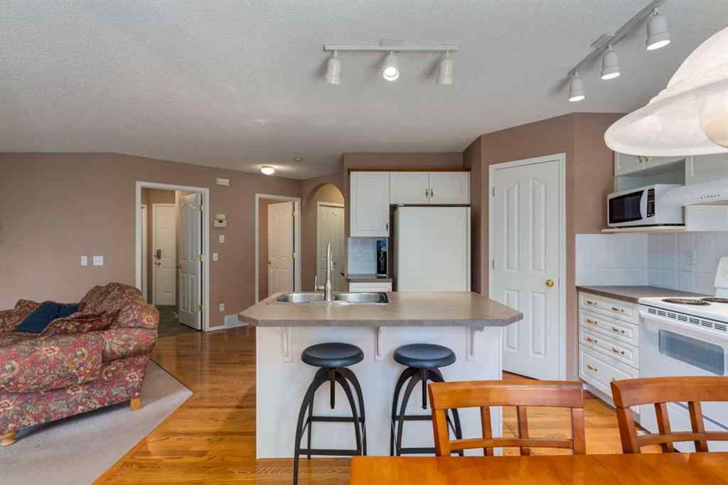 MLS® A2251606 - 165 Spring Crescent SW in Springbank Hill Calgary, Residential