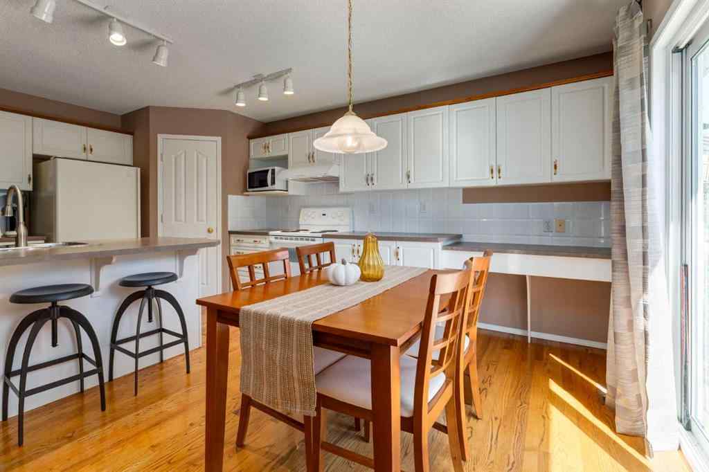 MLS® A2251606 - 165 Spring Crescent SW in Springbank Hill Calgary, Residential