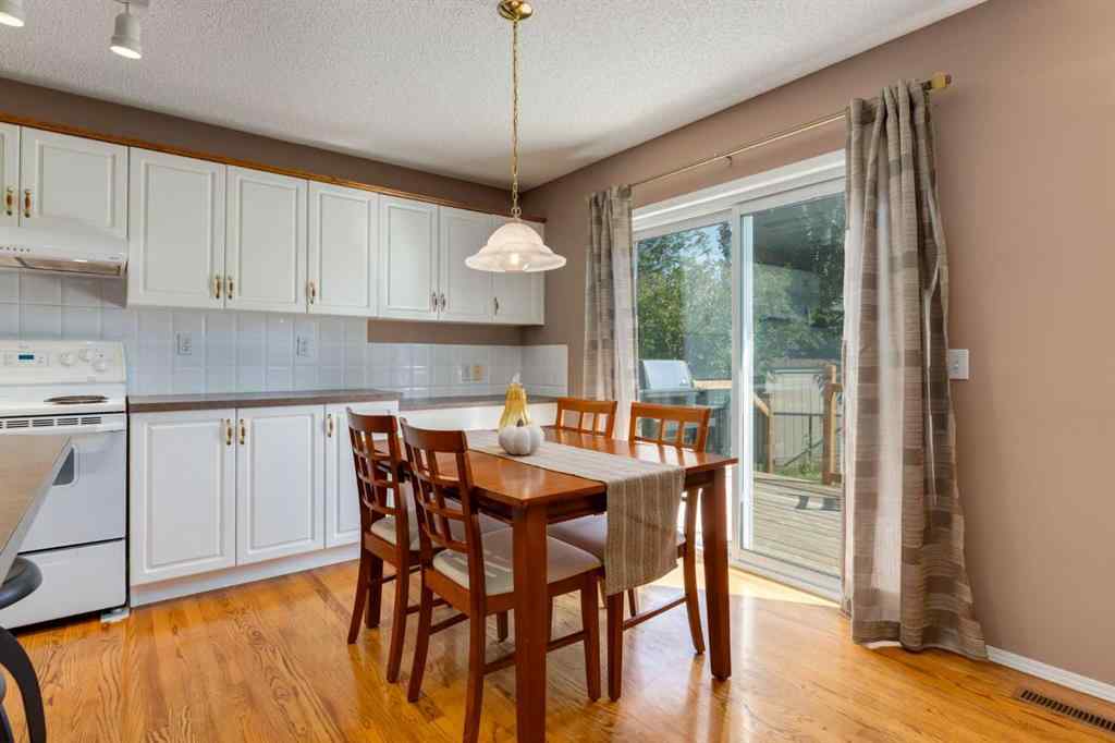 MLS® A2251606 - 165 Spring Crescent SW in Springbank Hill Calgary, Residential