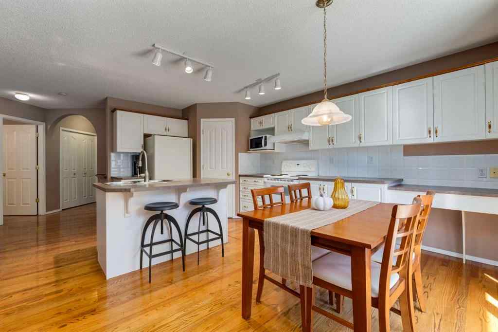 MLS® A2251606 - 165 Spring Crescent SW in Springbank Hill Calgary, Residential