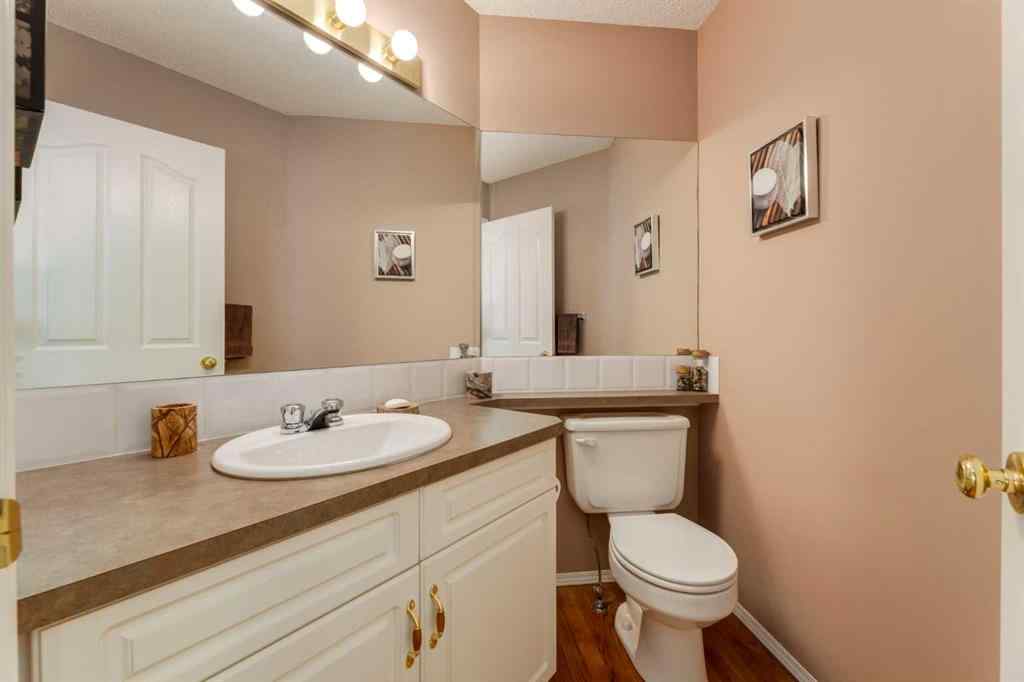 MLS® A2251606 - 165 Spring Crescent SW in Springbank Hill Calgary, Residential