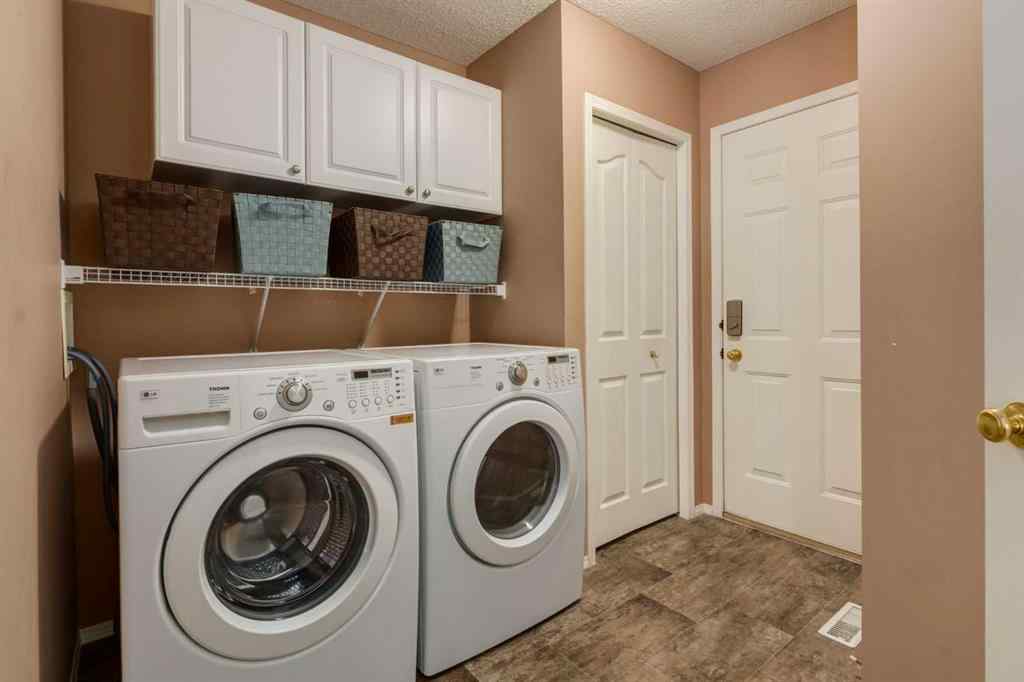 MLS® A2251606 - 165 Spring Crescent SW in Springbank Hill Calgary, Residential