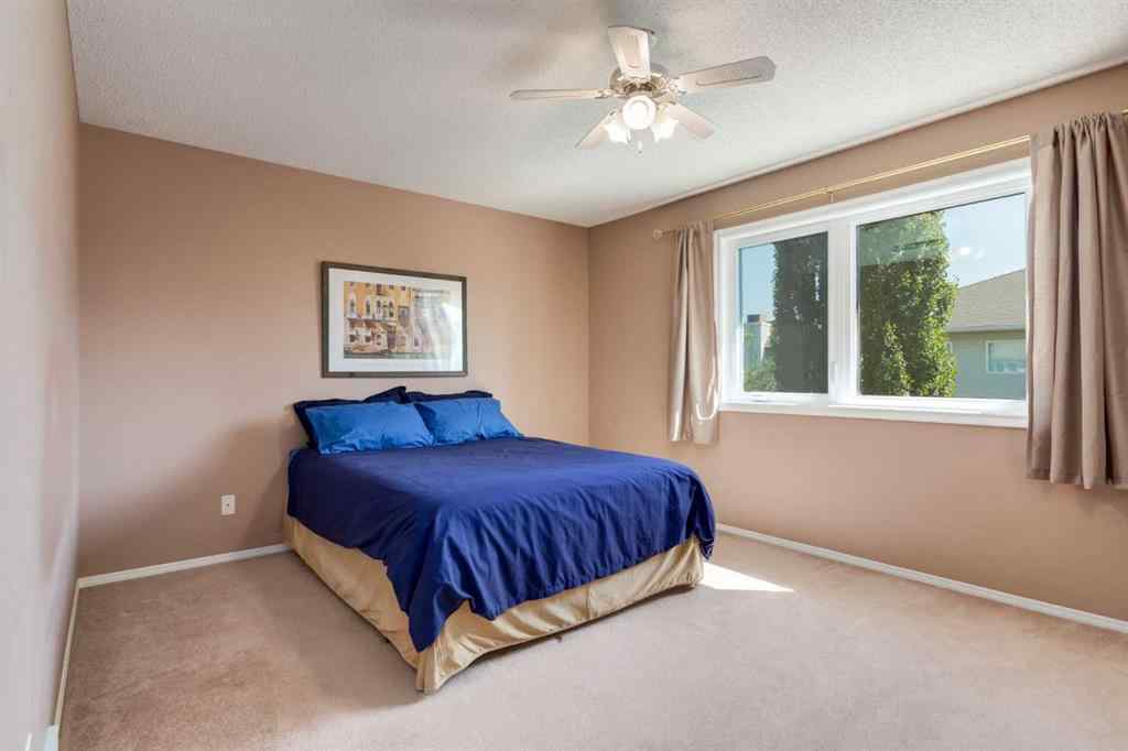 MLS® A2251606 - 165 Spring Crescent SW in Springbank Hill Calgary, Residential
