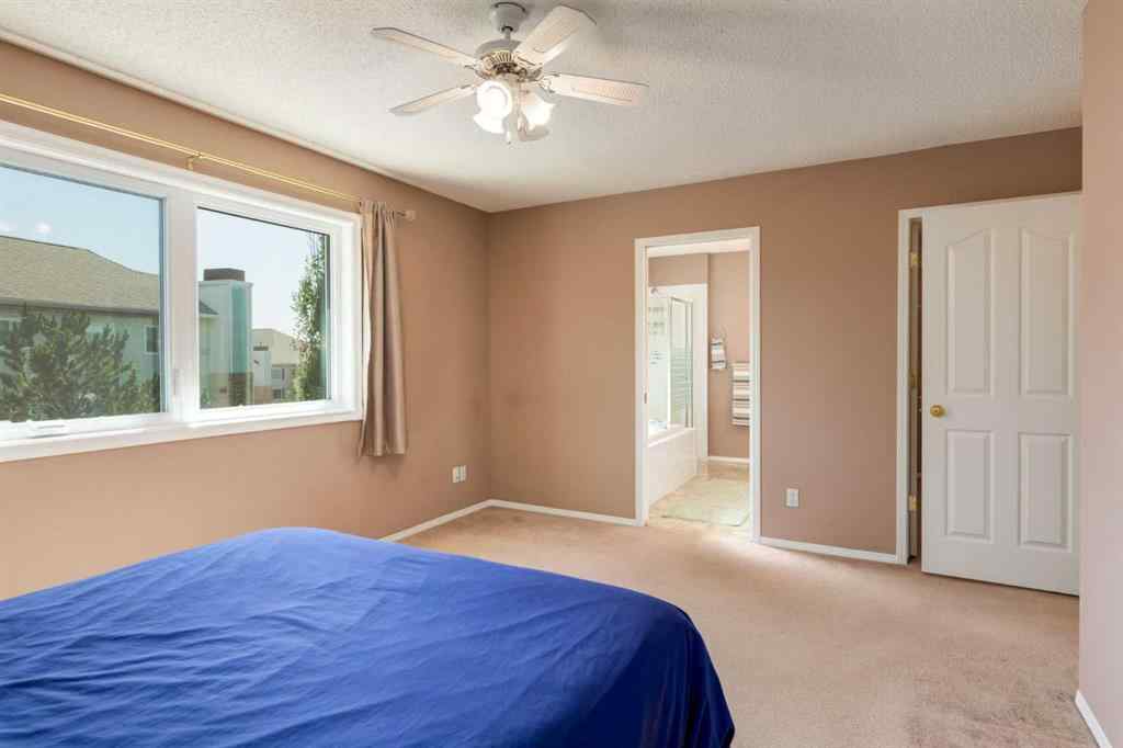 MLS® A2251606 - 165 Spring Crescent SW in Springbank Hill Calgary, Residential