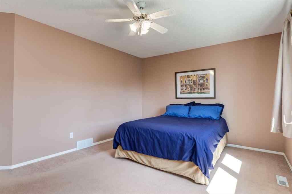 MLS® A2251606 - 165 Spring Crescent SW in Springbank Hill Calgary, Residential