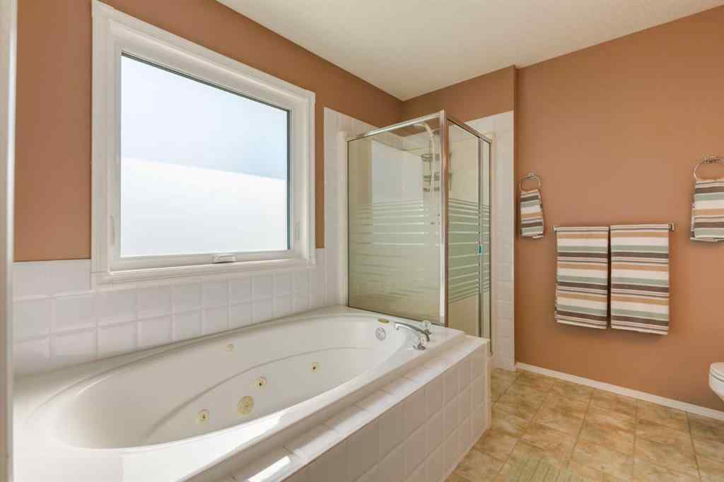MLS® A2251606 - 165 Spring Crescent SW in Springbank Hill Calgary, Residential