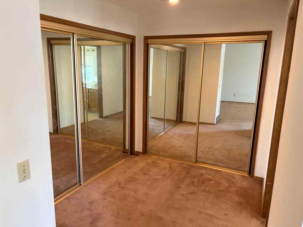 MLS® A2251615 - 256 Woodstock Place SW in Woodlands Calgary, Residential