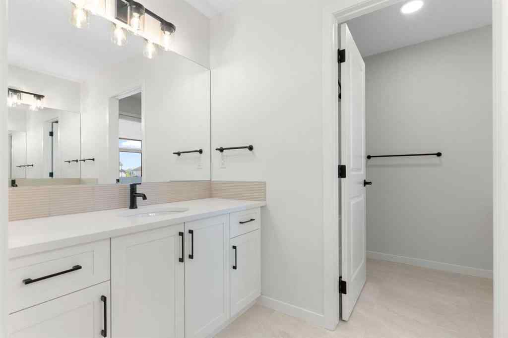 MLS® A2251621 - 266 West Grove Lane SW in West Springs Calgary, Residential