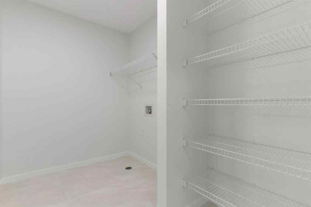 MLS® A2251621 - 266 West Grove Lane SW in West Springs Calgary, Residential
