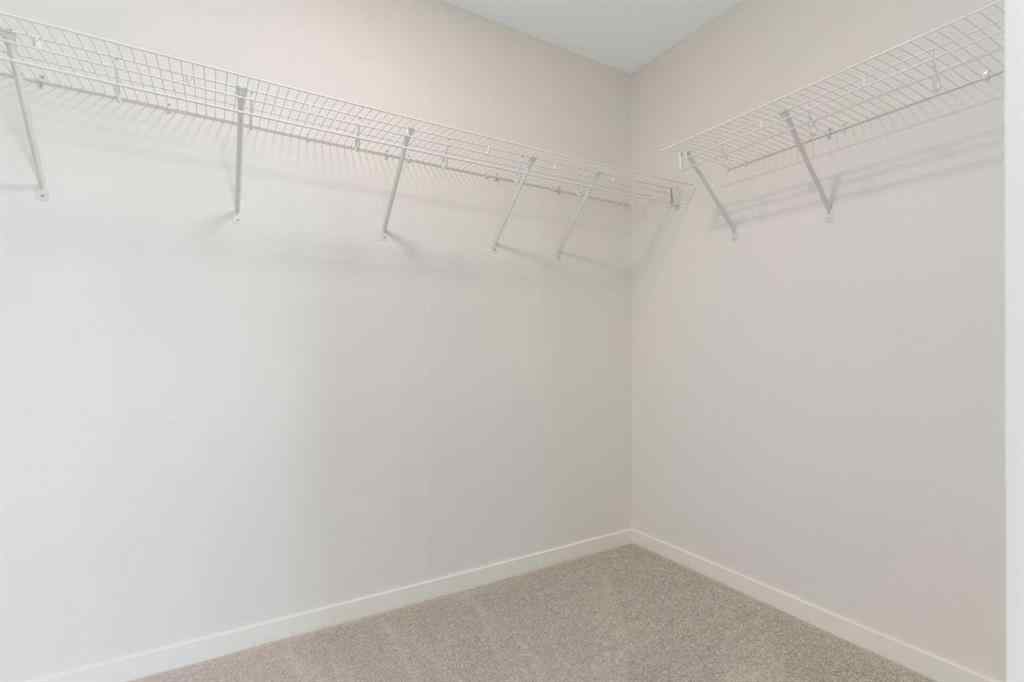 MLS® A2251621 - 266 West Grove Lane SW in West Springs Calgary, Residential
