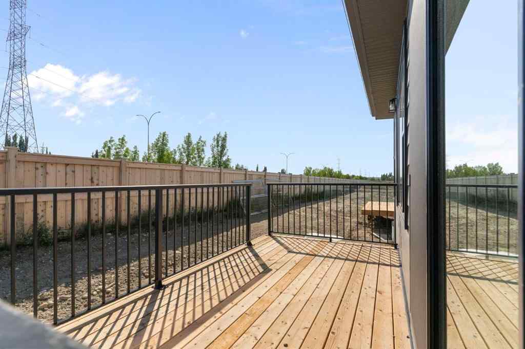 MLS® A2251621 - 266 West Grove Lane SW in West Springs Calgary, Residential