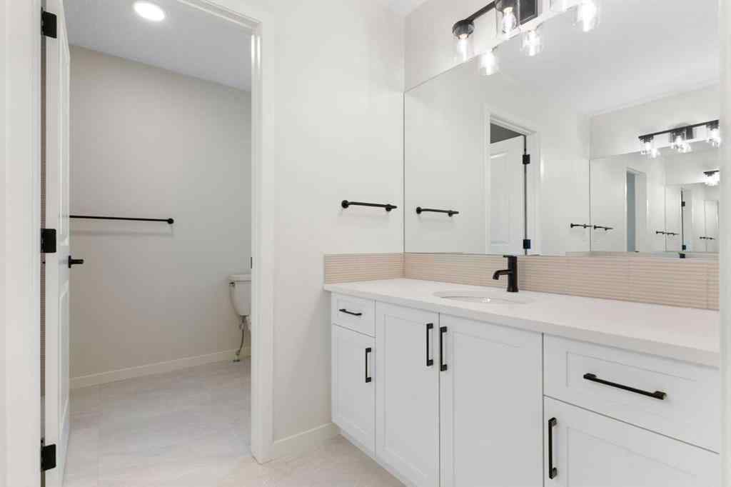 MLS® A2251621 - 266 West Grove Lane SW in West Springs Calgary, Residential
