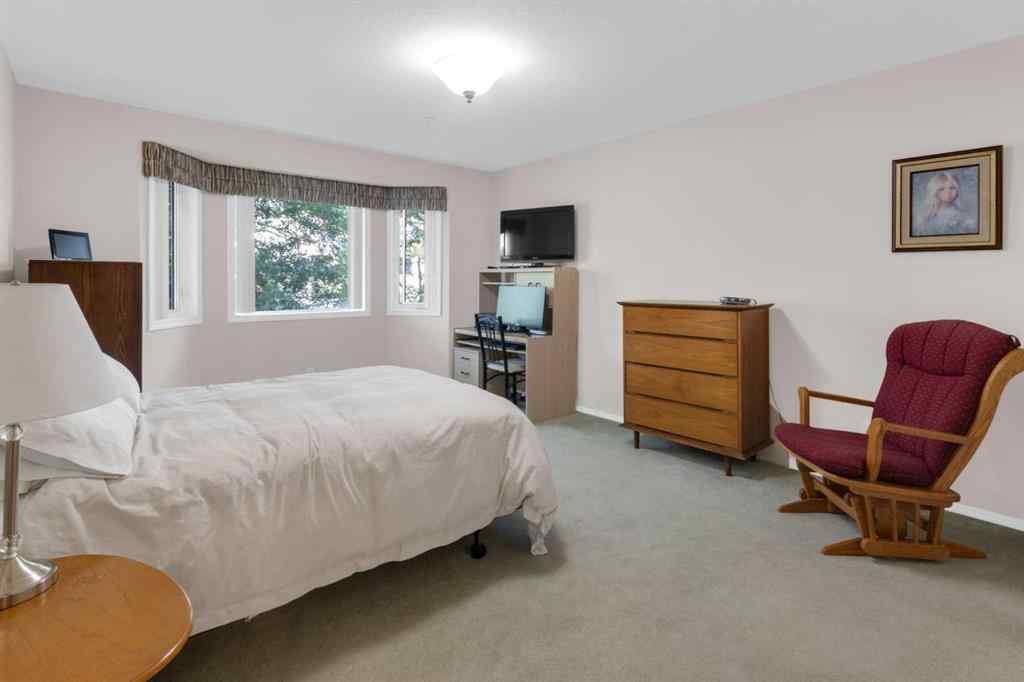 MLS® A2251623 - Unit #203 2850 51 Street SW in Glenbrook Calgary, Residential