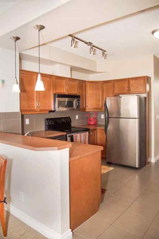 MLS® A2251646 - Unit #14 153 Rockyledge View NW in Rocky Ridge Calgary, Rental
