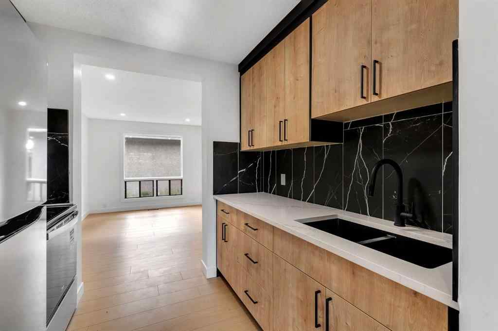 MLS® A2251651 - Unit #104 6915 Ranchview Drive NW in Ranchlands Calgary, Residential