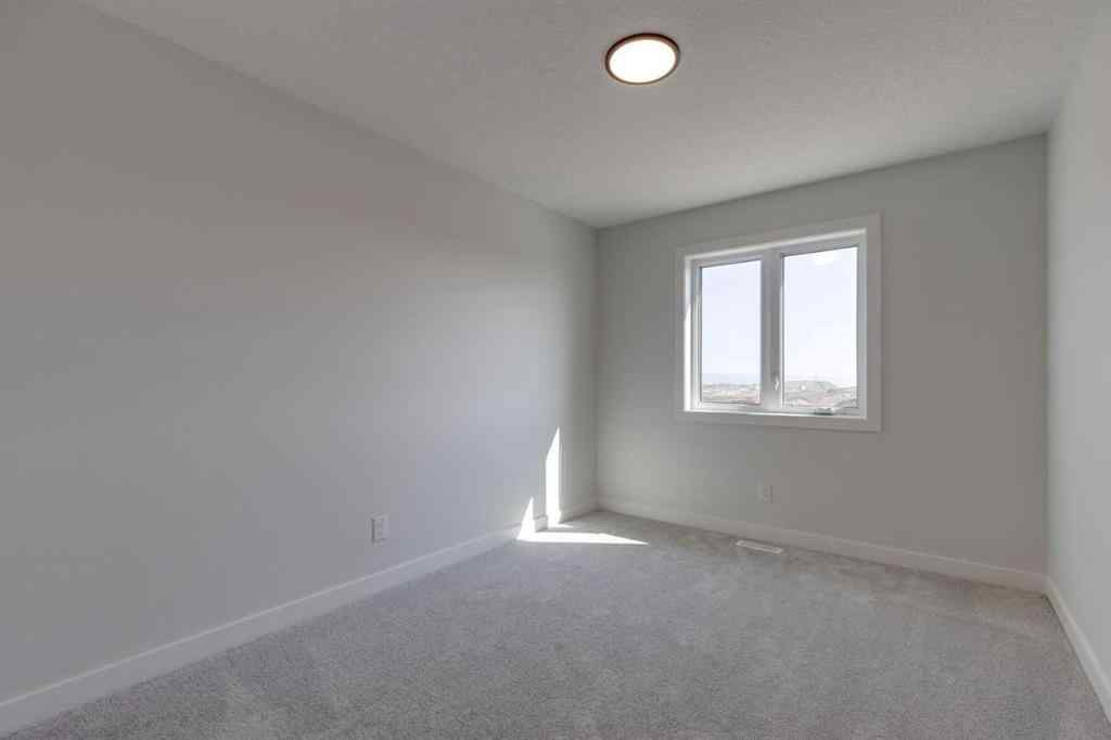 MLS® A2251670 - 65 Southborough Lane  in Southbow Landing Cochrane, Residential