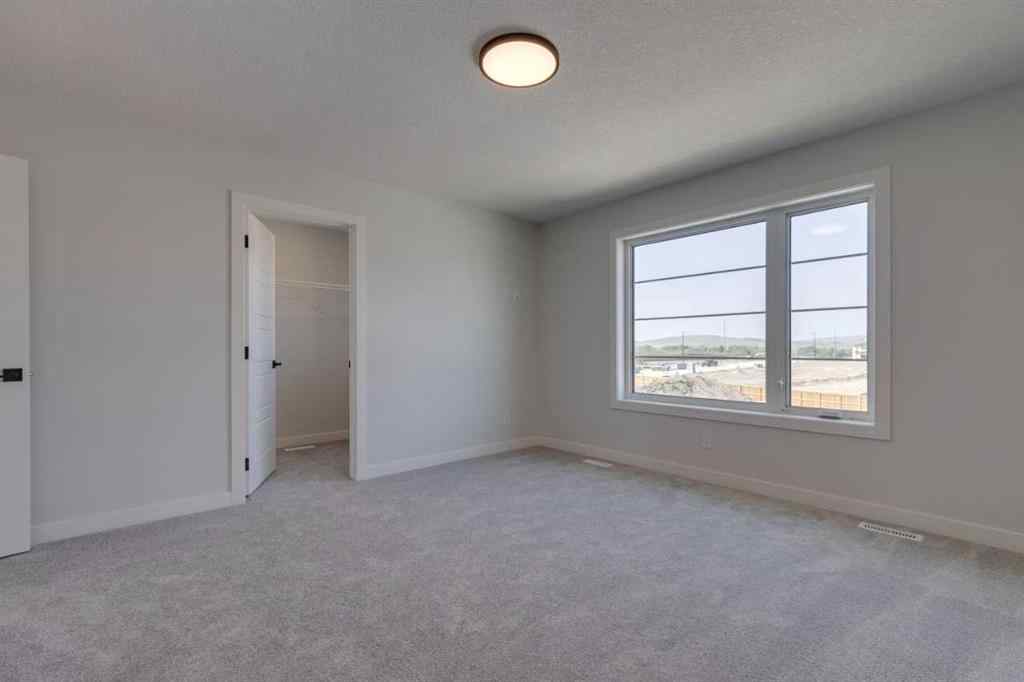MLS® A2251670 - 65 Southborough Lane  in Southbow Landing Cochrane, Residential