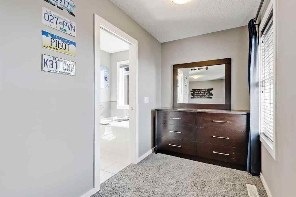 MLS® A2251675 - 296 Marquis Heights SE in Mahogany Calgary, Residential