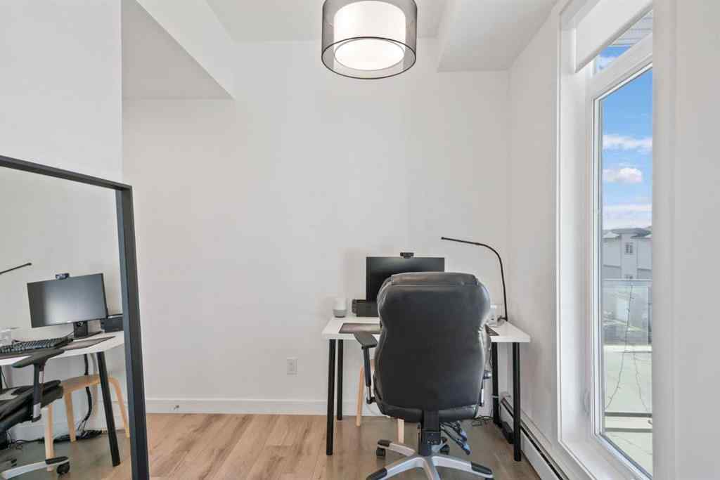 MLS® A2251676 - Unit #217 205 Spring Creek Common SW in Springbank Hill Calgary, Residential