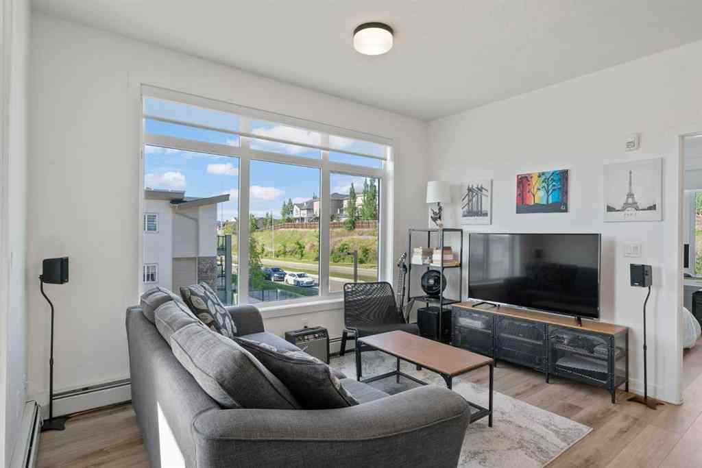 MLS® A2251676 - Unit #217 205 Spring Creek Common SW in Springbank Hill Calgary, Residential